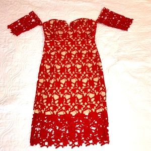 Forever 21 women’s lacy red dress with light tan colored lining.  Small.  NWT